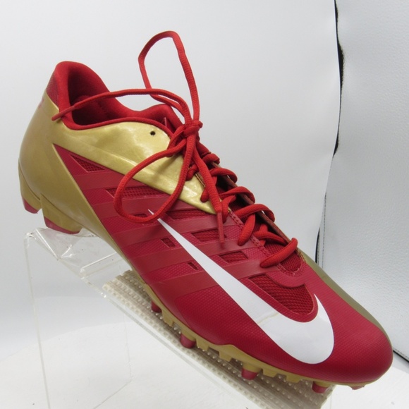 gold and red football cleats